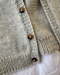 Detaljebillede af grå Ankers Jakke