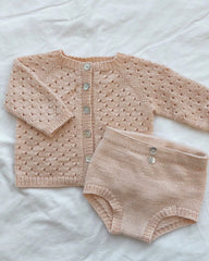 Liggende lyserødt Ellens Legesæt