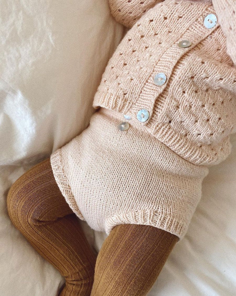 Detaljebillede af lyserødt Ellens Legesæt