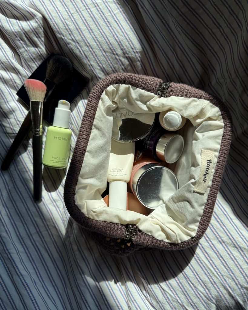 Åbentstående brun Juno Clutch