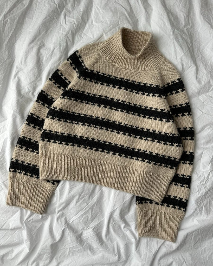 Liggende hvid og grå Key Sweater