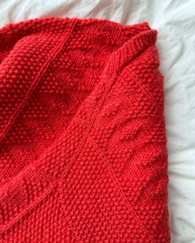 Liggebillede af rød Little Esther Jacket