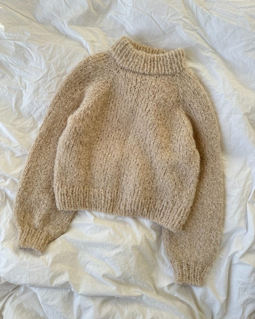 Ligggebillede af hvid Louisiana Sweater