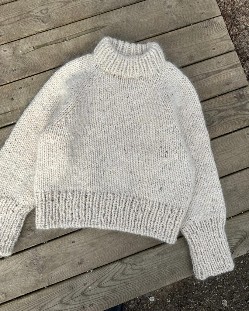 Liggebillede af hvid Marble Sweater