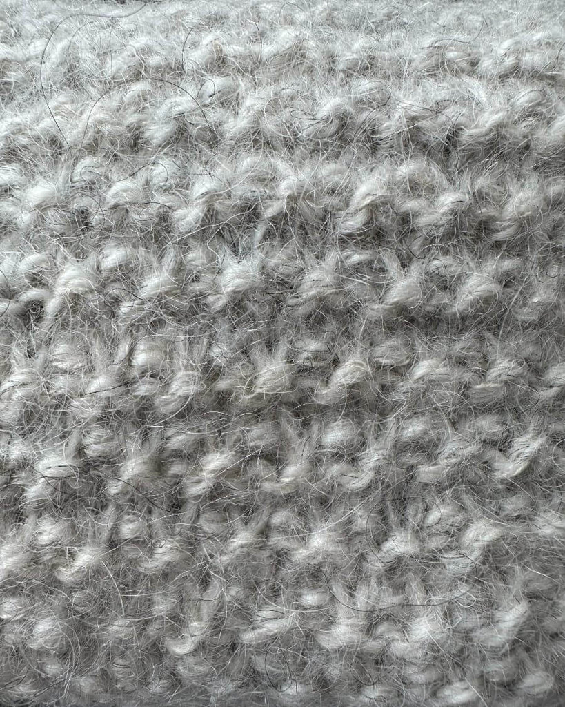 Closeup af struktur på grå Marie Case