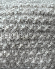 Closeup af struktur på grå Marie Case