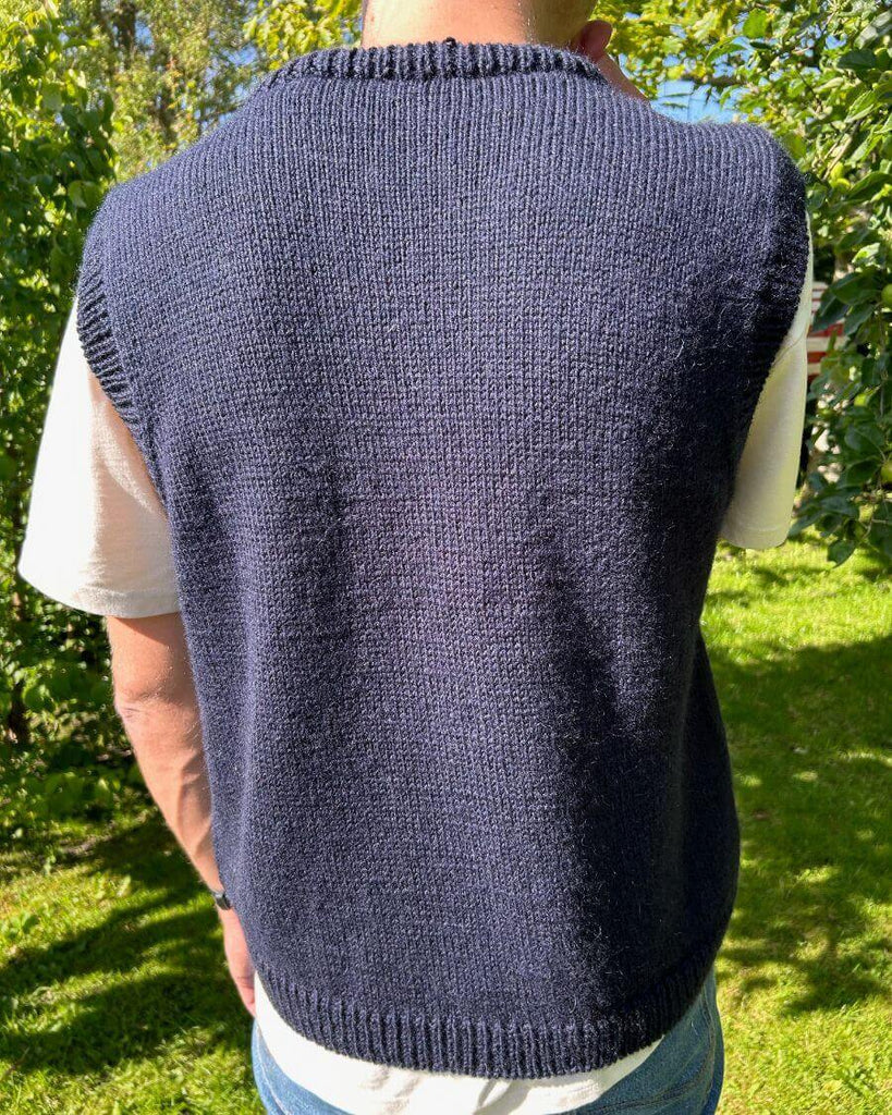 Mand iført blå Novice Slipover Man