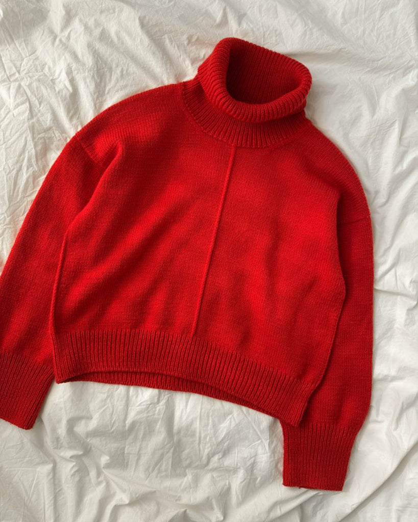 Liggebillede af rød Scarlet Sweater