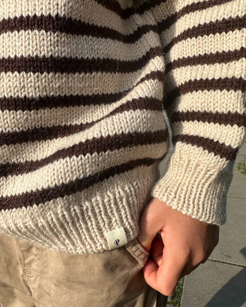 Detaljebillede af sort og hvid Seaside Sweater