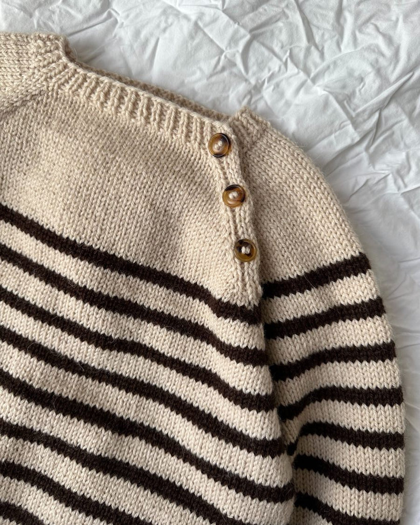 Detaljebillede af sort og hvid Seaside Sweater