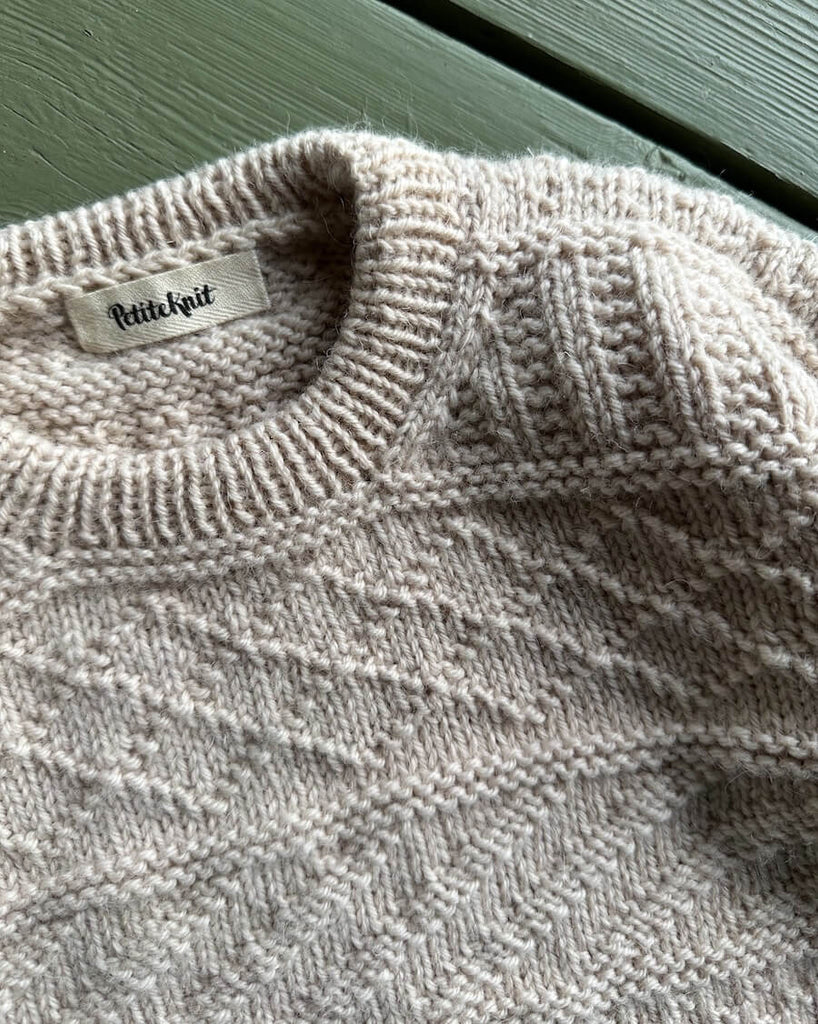 Detaljebillede af lysbeige Storm Sweater Junior
