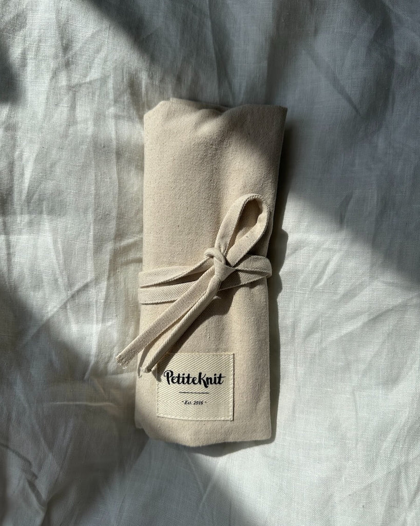 Sammenfoldet pindeetui til strømpepinde