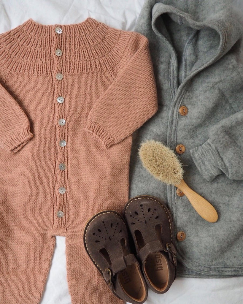 Liggende lyserød Ankers Heldragt