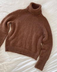 Brun Terrazzo Sweater på dyne