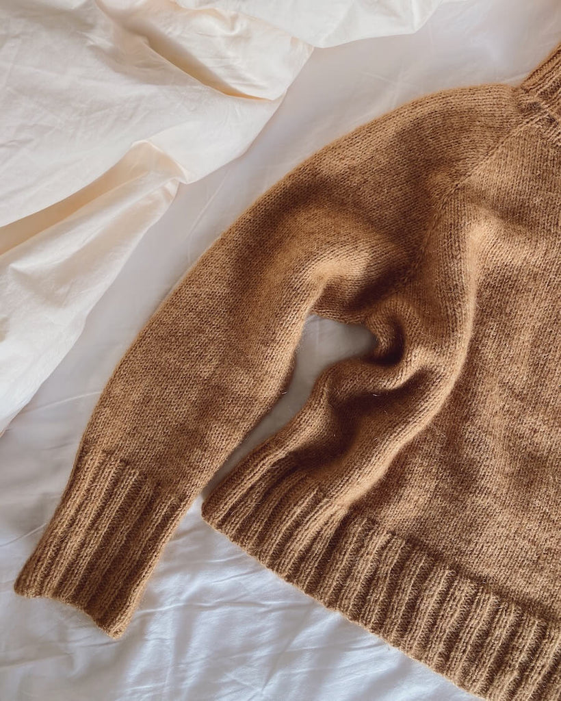 Closeup af brun Caramel Sweater