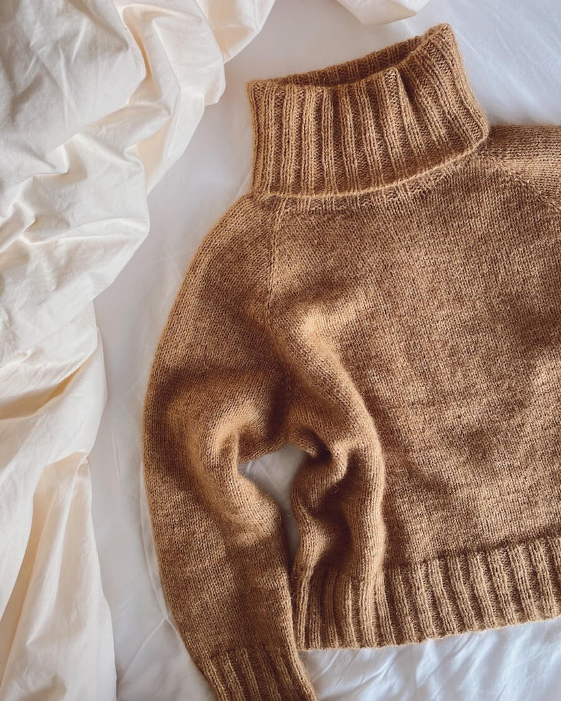 Liggende brun Caramel Sweater