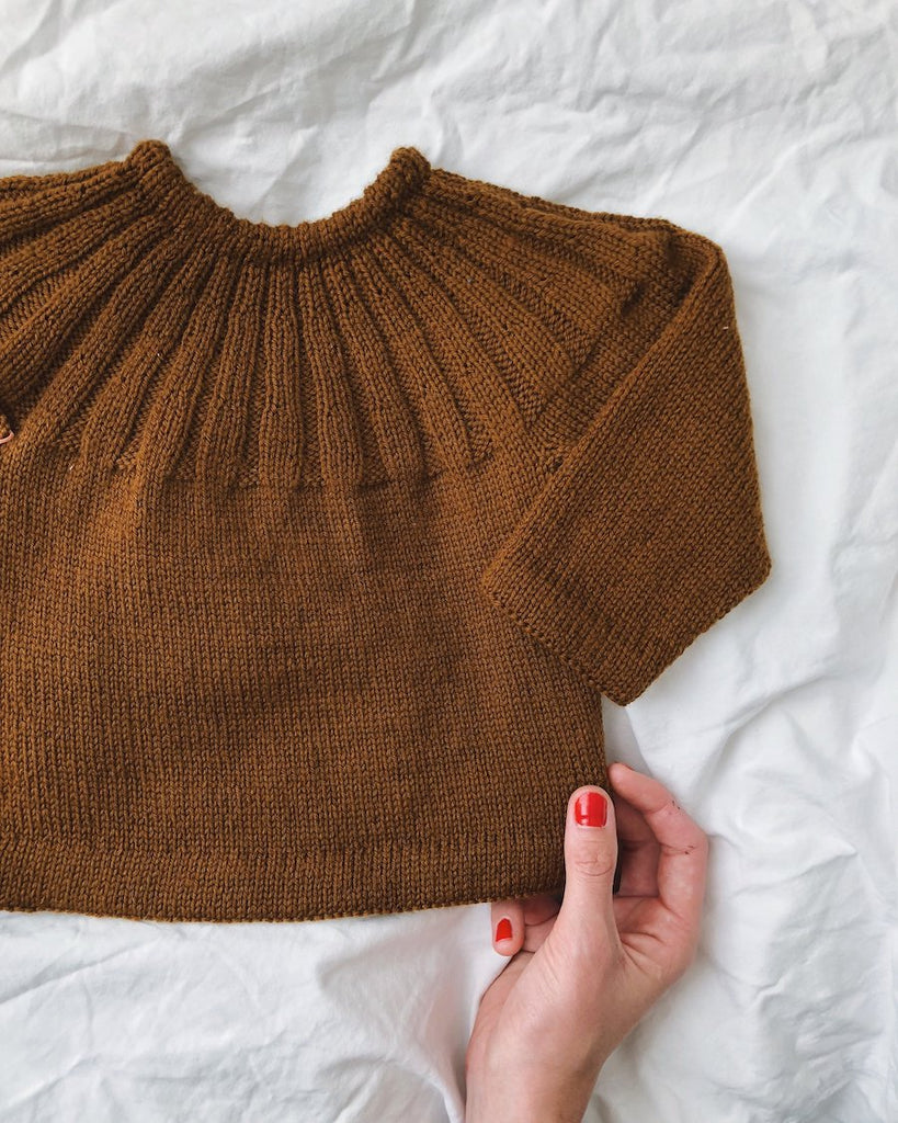 Liggende brun Haralds Trøje