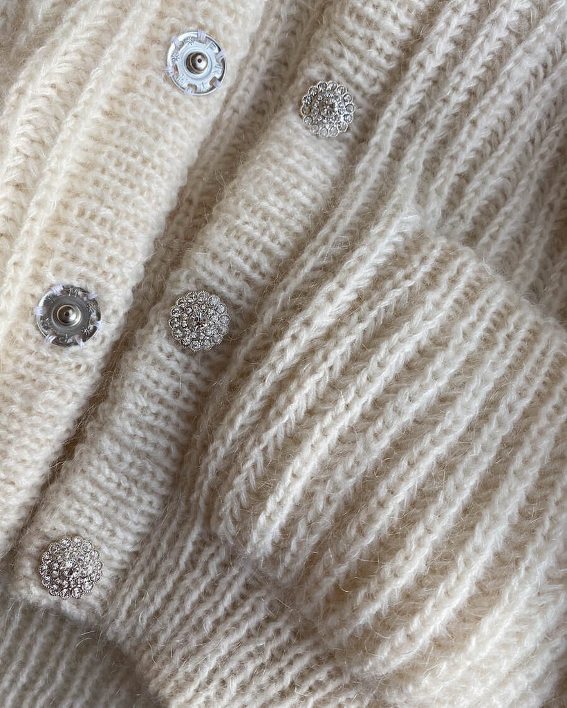 Detaljebillede af hvid September Jakke