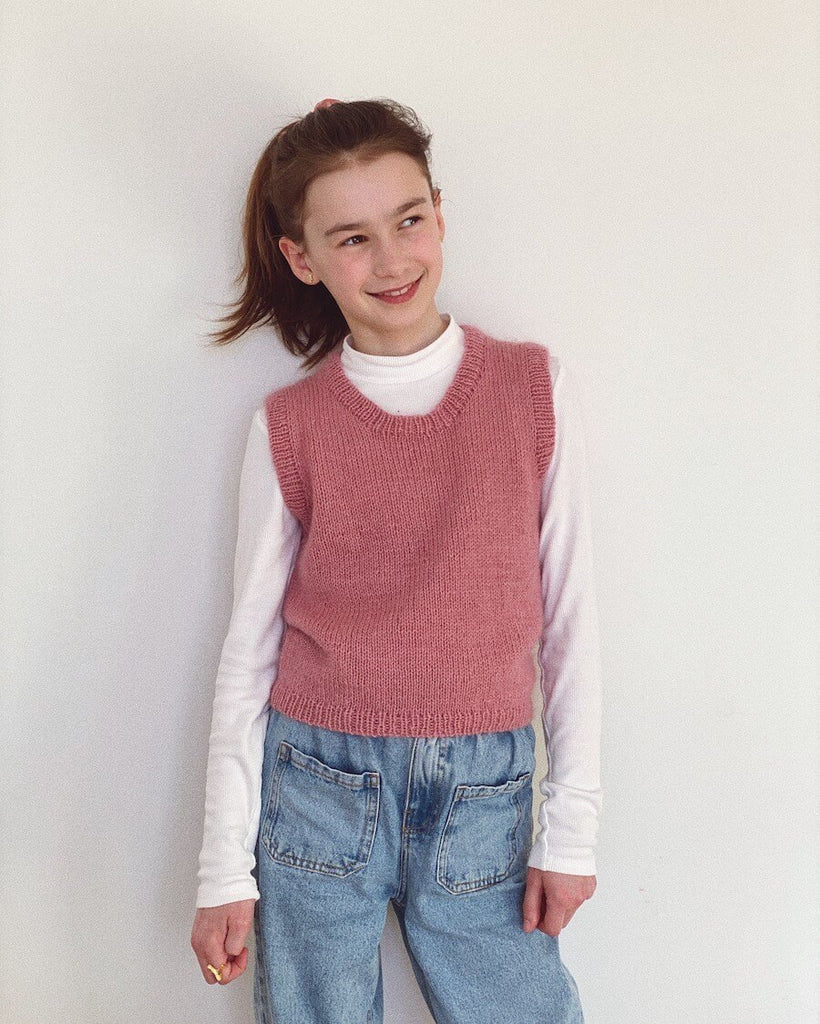 Pige iført lyserød Stockholm Slipover Junior