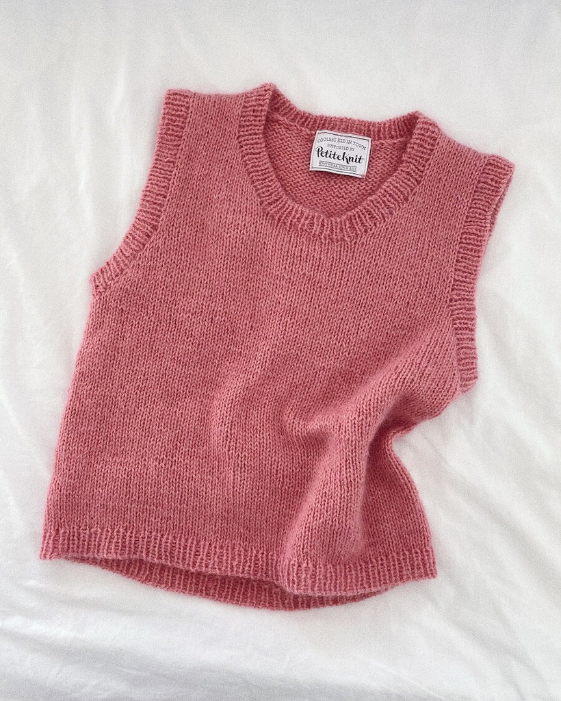 Liggebillede af lyserød Stockholm Slipover Junior