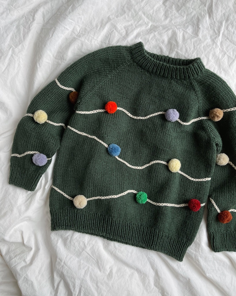 Liggebillede af grøn Let's Christmas Sweater