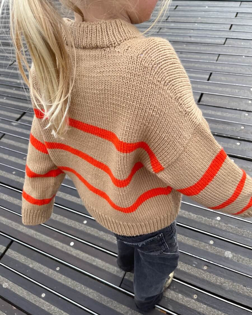 Barn iført brun og orange Marseille Sweater Junior