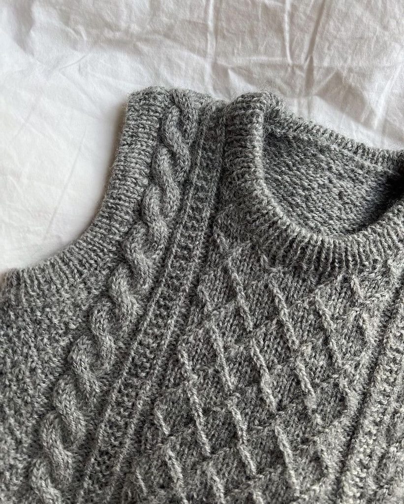 Detaljebillede af grå Moby Slipover Baby