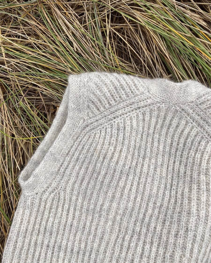 Closeup af lysegrå November Vest
