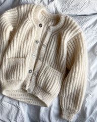 Liggebillede af hvid September Jakke