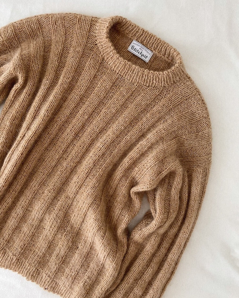 Liggebillede af beige Striber På Langs Sweater