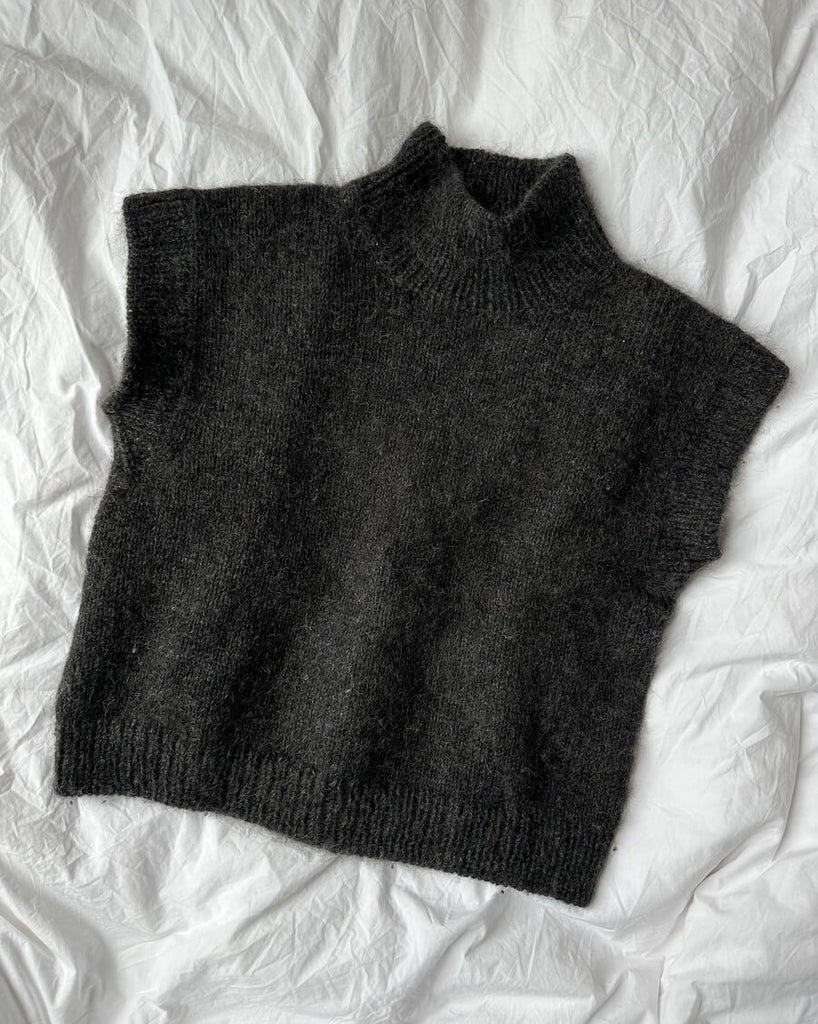 Grå Weekend Slipover på dyne