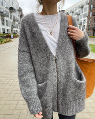 Kvinde iført grå Zipper Jacket