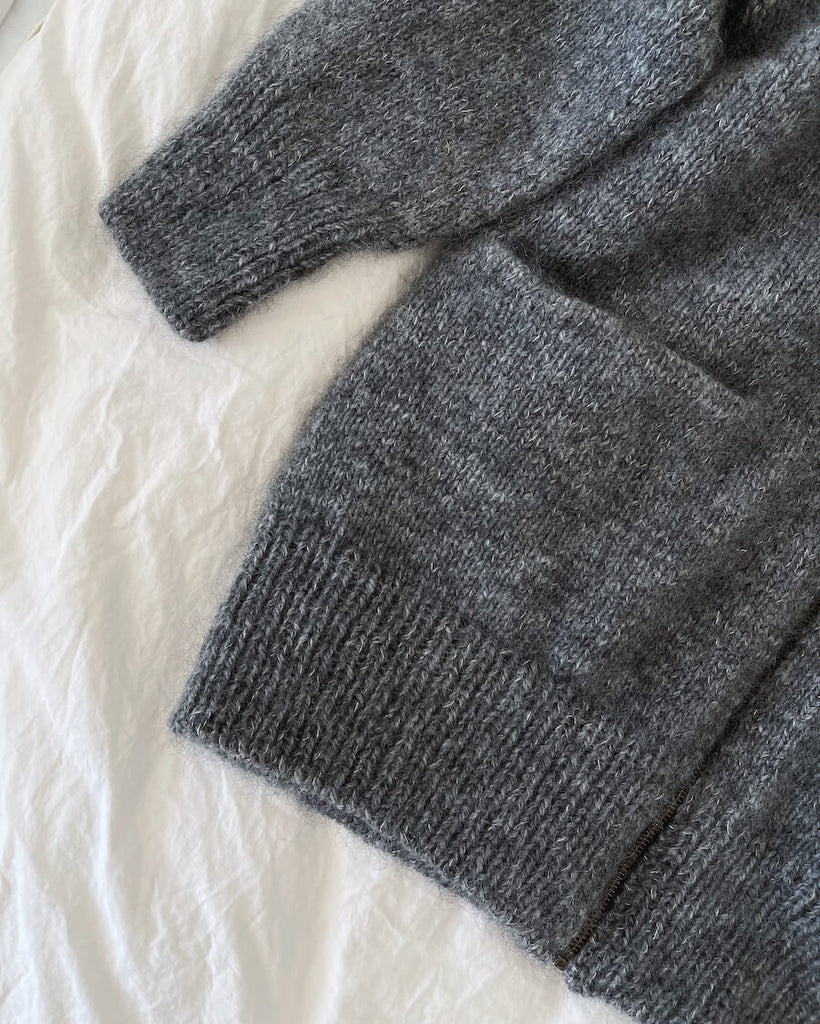 Detaljebillede af grå Zipper Jacket