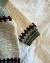 Cross Cardigan Baby closeup