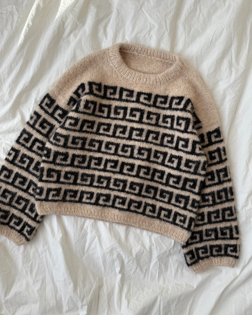 Beige og sort Athene Sweater liggende