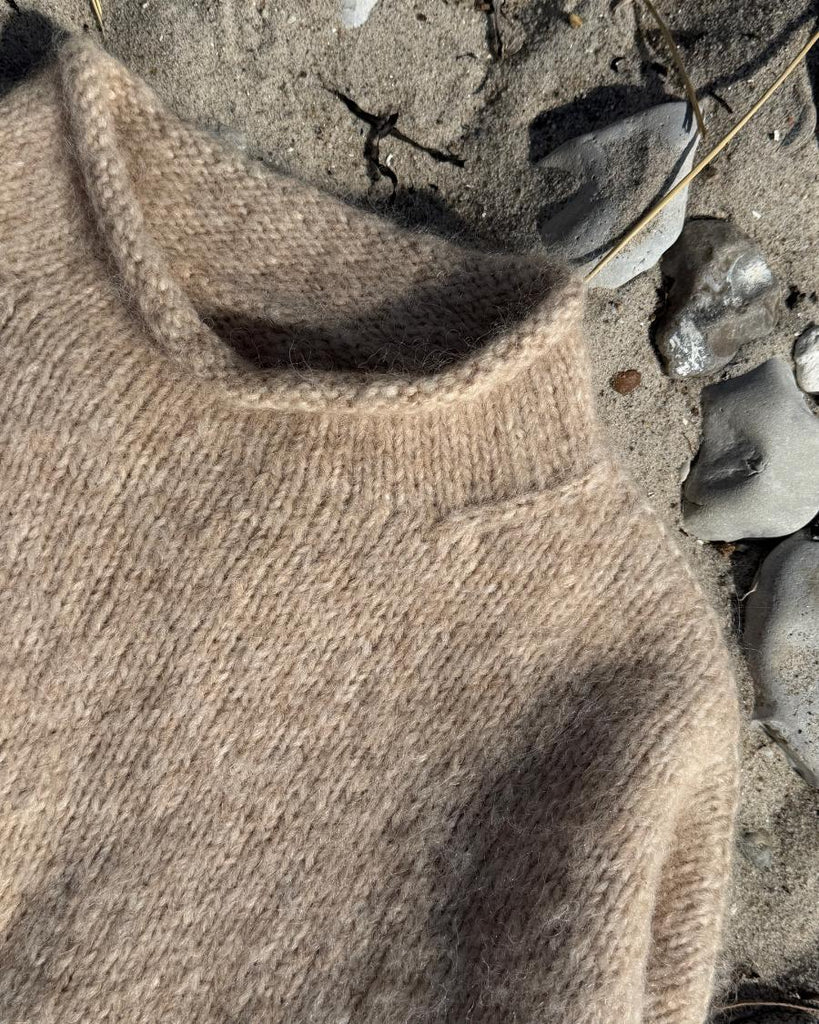 Closeup af beige Cloud Sweater