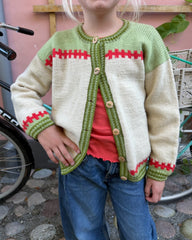 Barn iført Cross Cardigan Junior