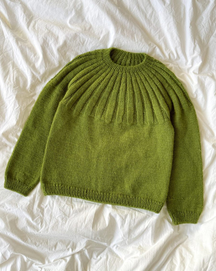 Dreng med grøn Haralds Sweater