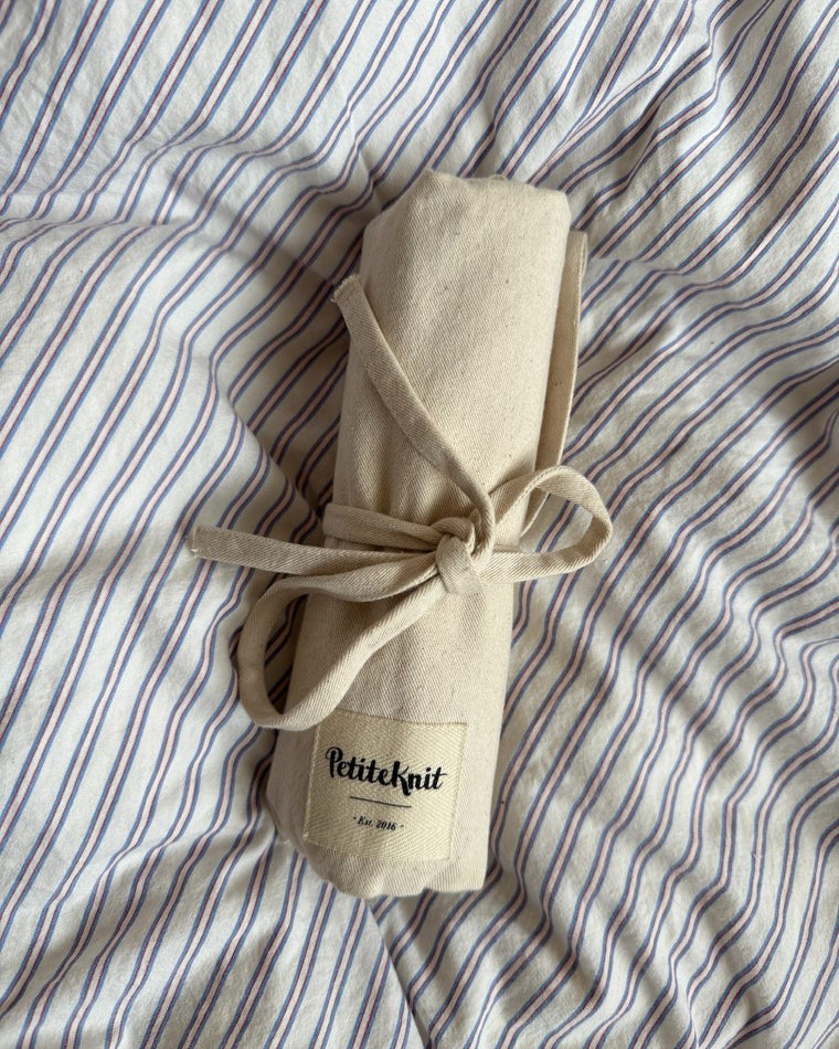 Sammenfoldet pindeetui til strømpepinde