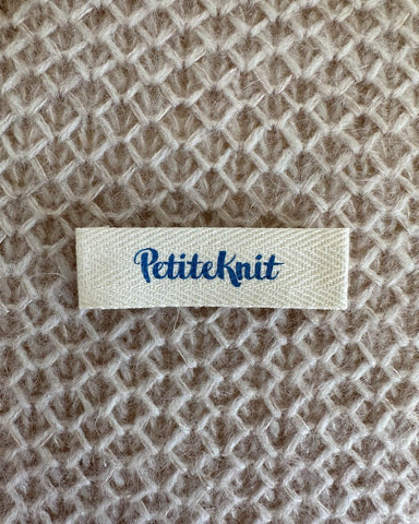 Ét electric blue petiteknit label 