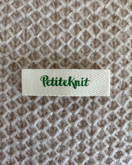 Statement green Petiteknit label