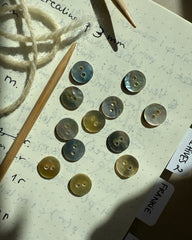 12 knapper af perlemor