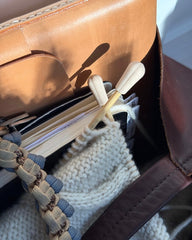 Pindebeskyttere på strikketøj i taske