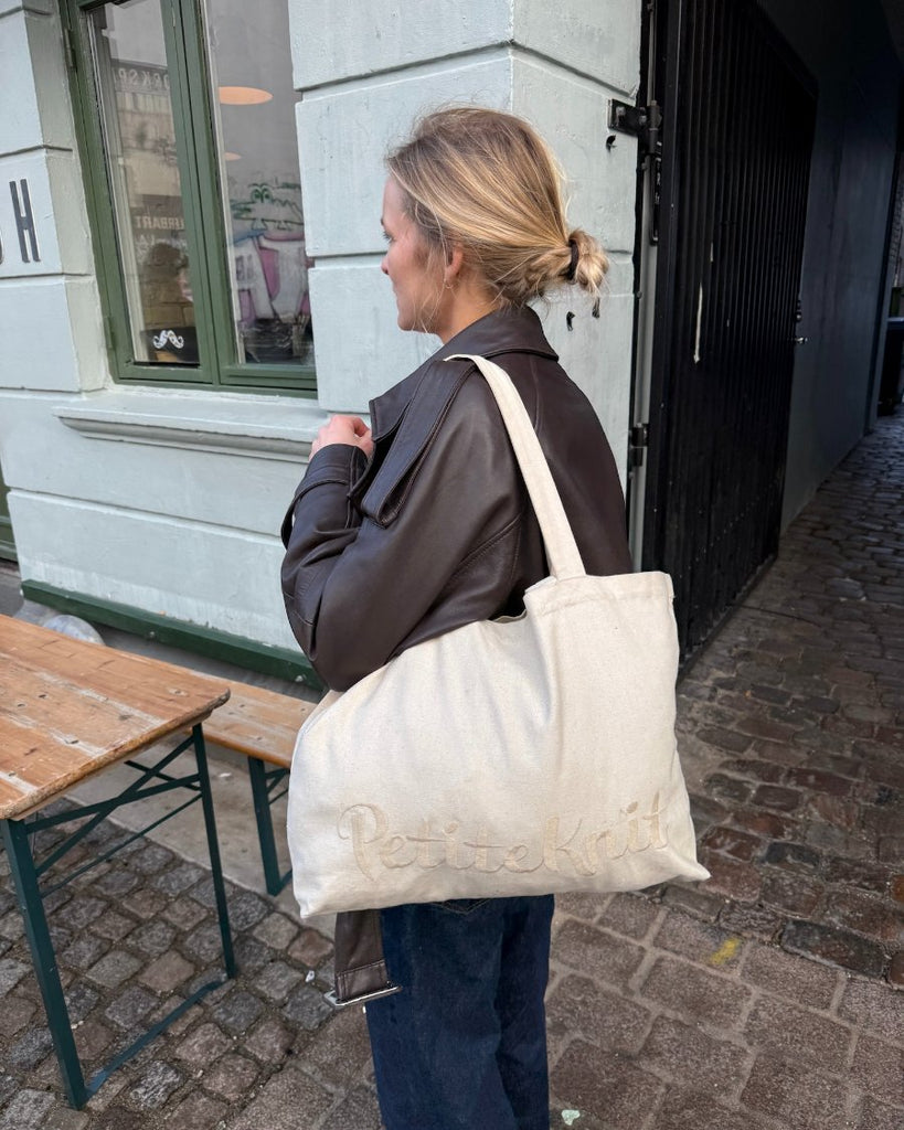 Kvinde med Signature Shopper
