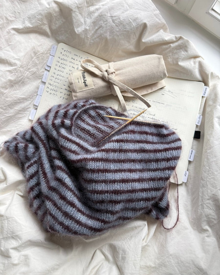 Sammenfoldet pindeetui til strømpepinde