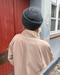 Kvinde iført grøn Terrazzo Hue