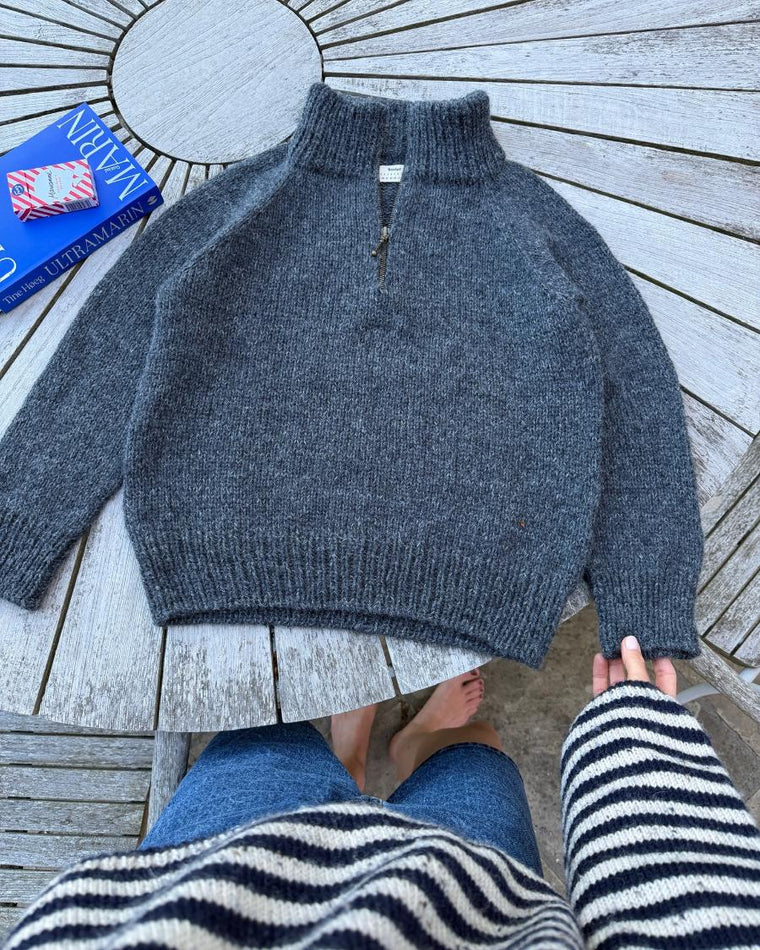 Lyserød Zipper Sweater Junior på dyne