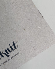 Petiteknit 2. sorterings mappe med fejl i kanten