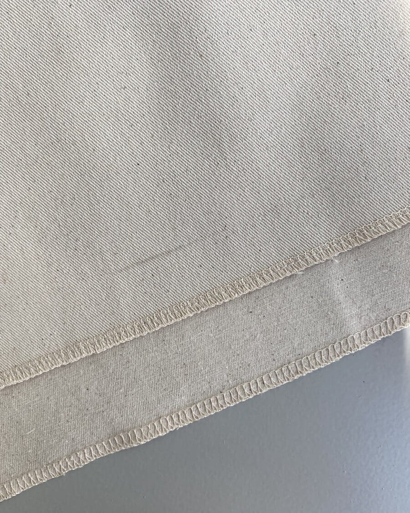 2. sorterings 40x60 cm bagbeklædning med sort streg 