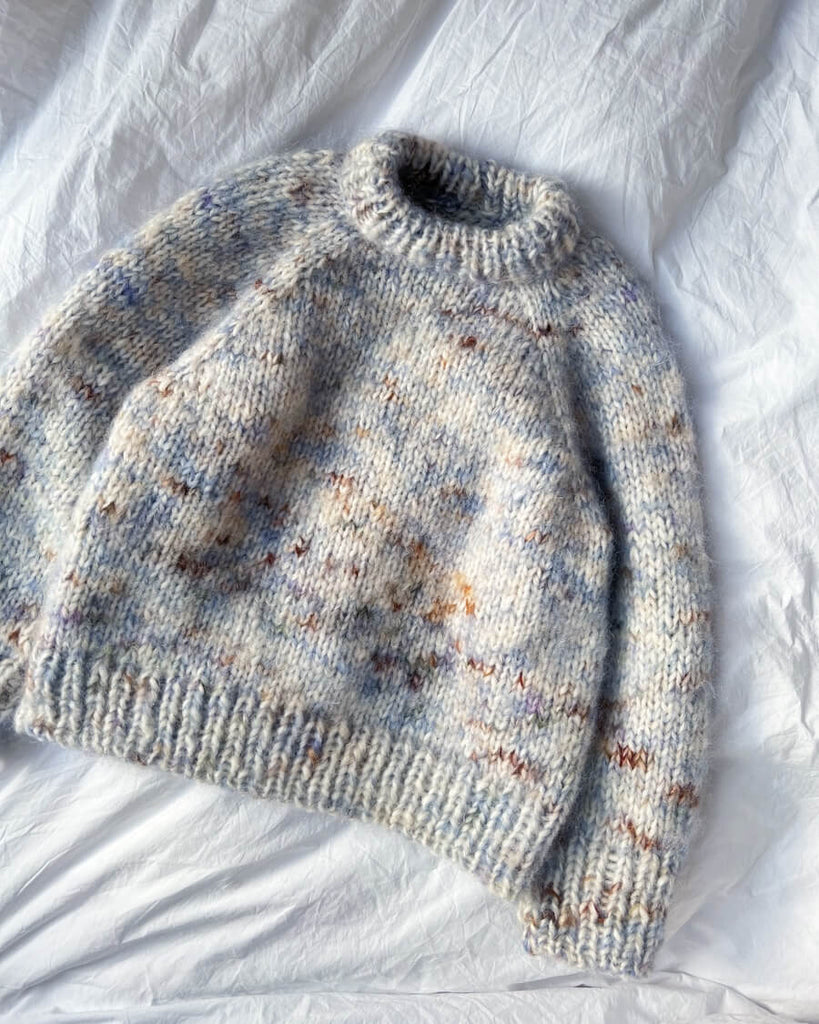 Liggebillede af blå Marble Sweater Junior